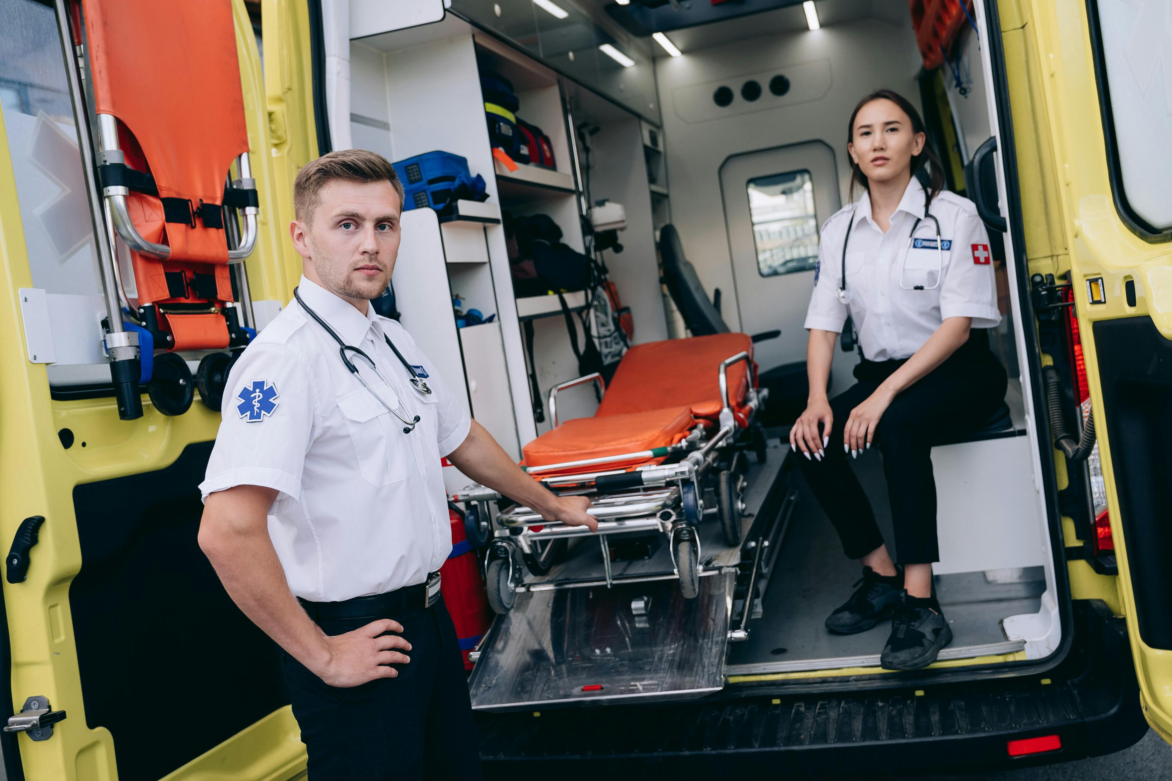 EMT paramedics with an ambulance ready to respond