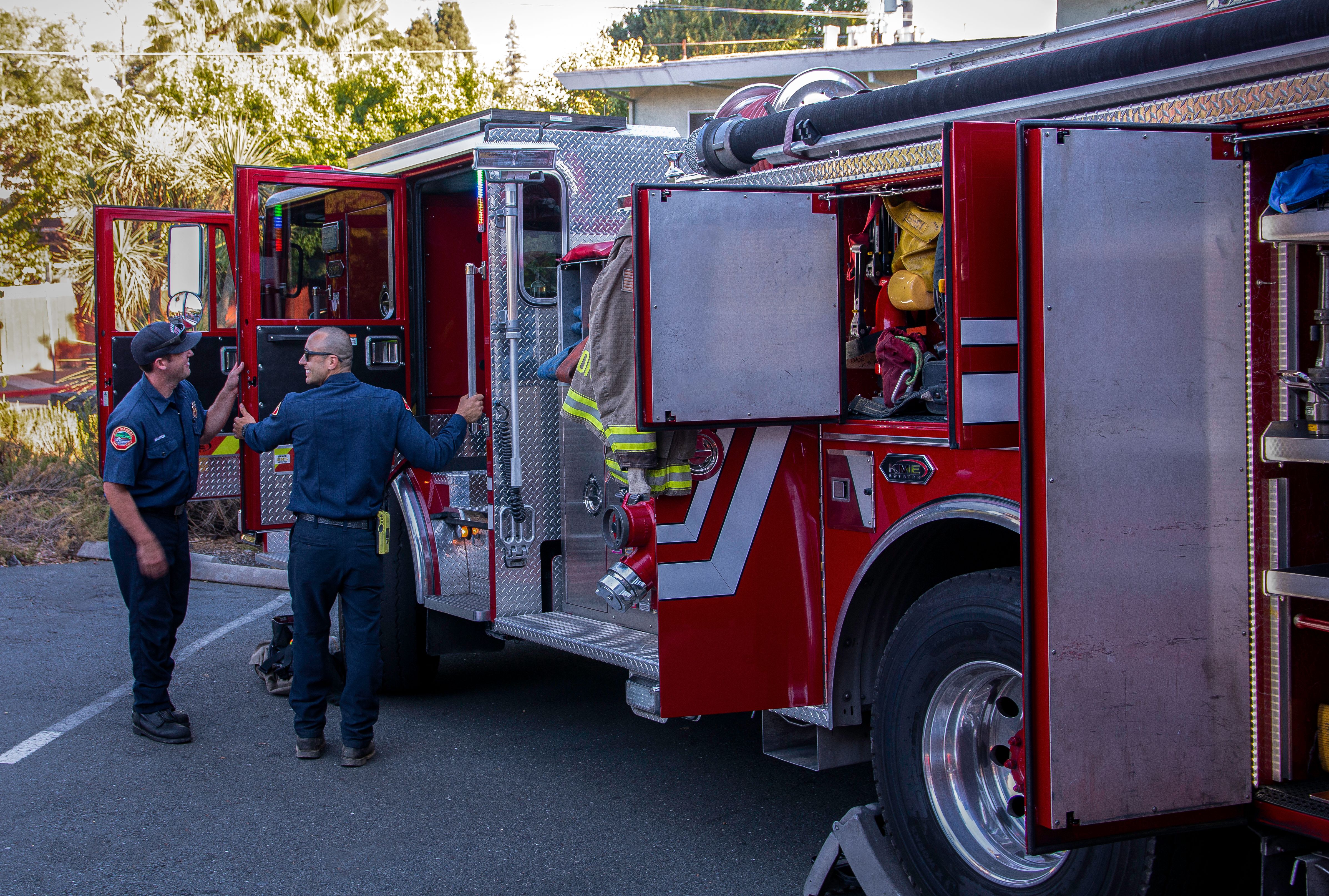 Firefighters in uniform at a New Jersey fire station