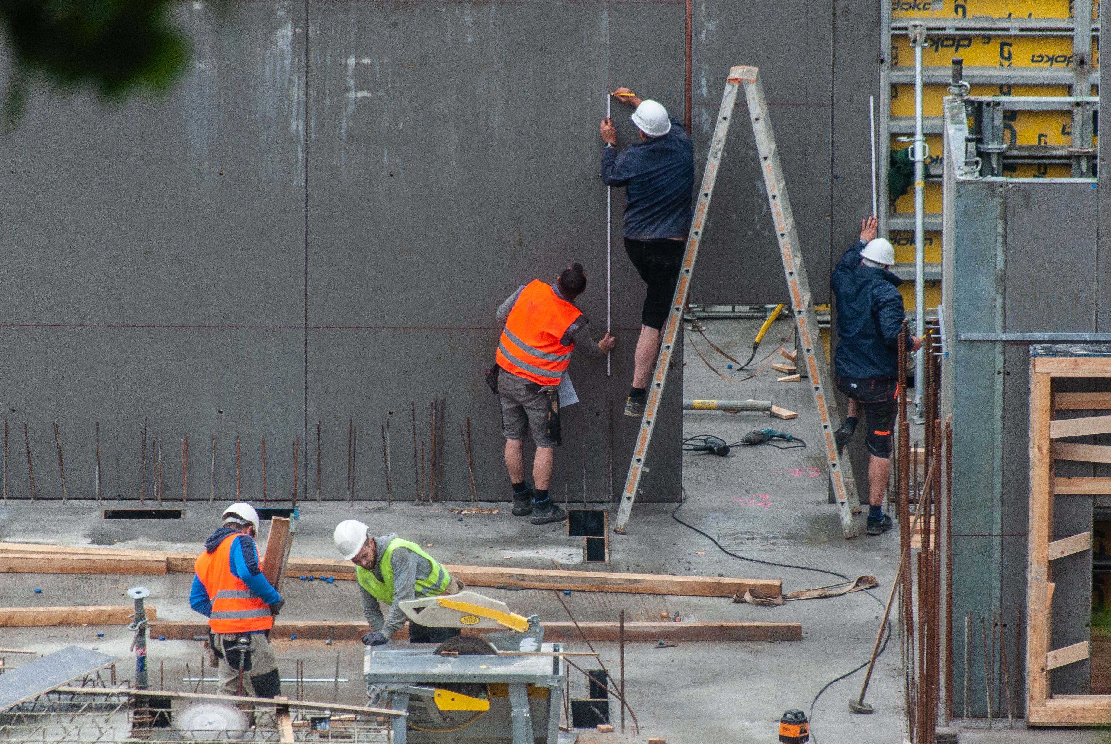 Construction crew in safety gear at a New Jersey job site